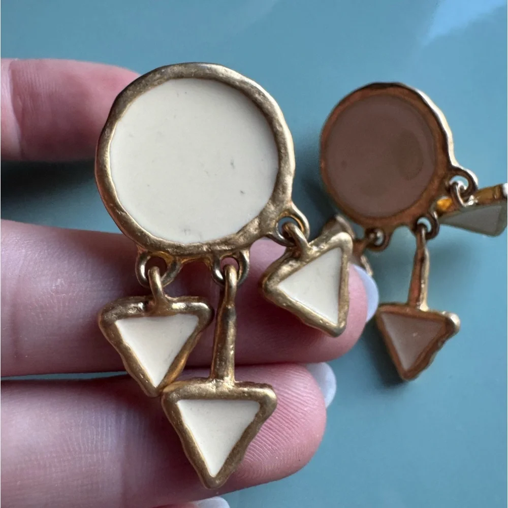 Vintage cream enamel and gold tone clip on dangle earrings